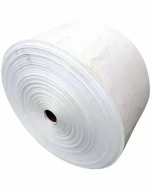 Large roll of white woven fabric at an angle, showing the wound layers and the centre hole.